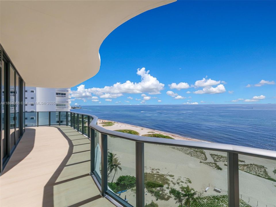 Wrap around balcony oceanfront NE corner