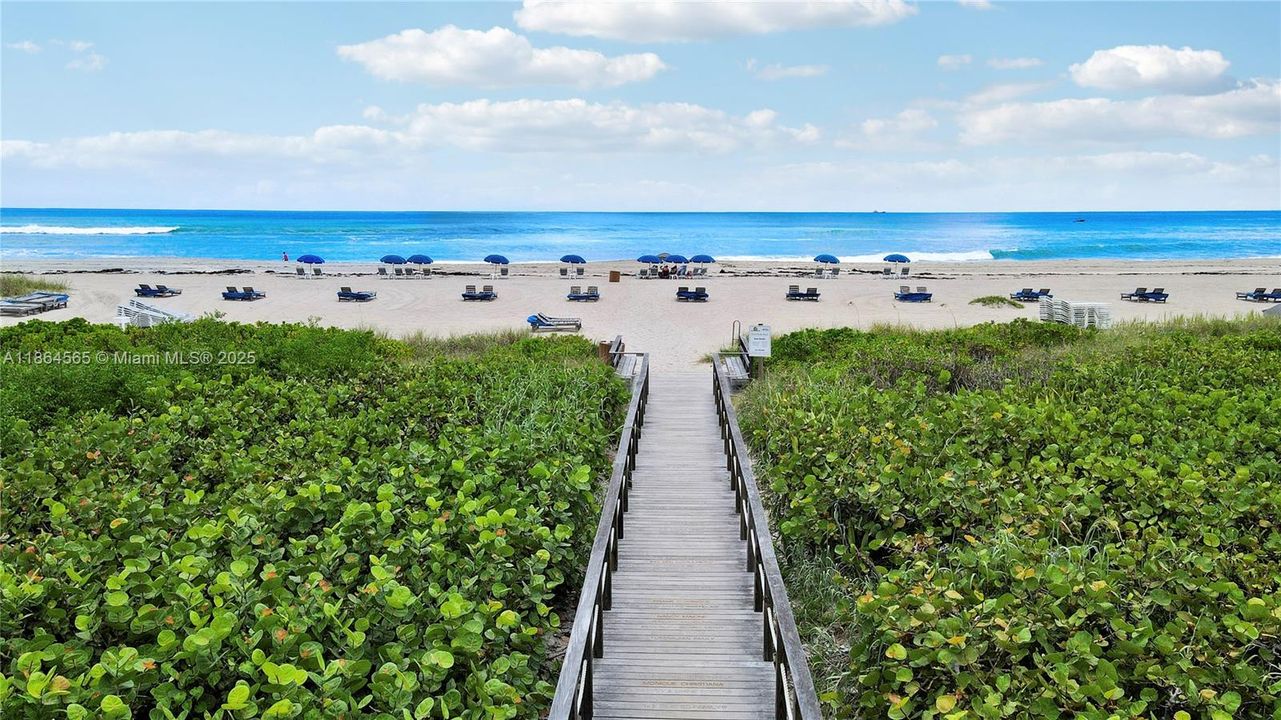 Private boardwalk leading to the beach.