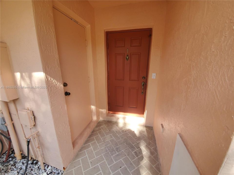 Front Door, storage closet to the left.