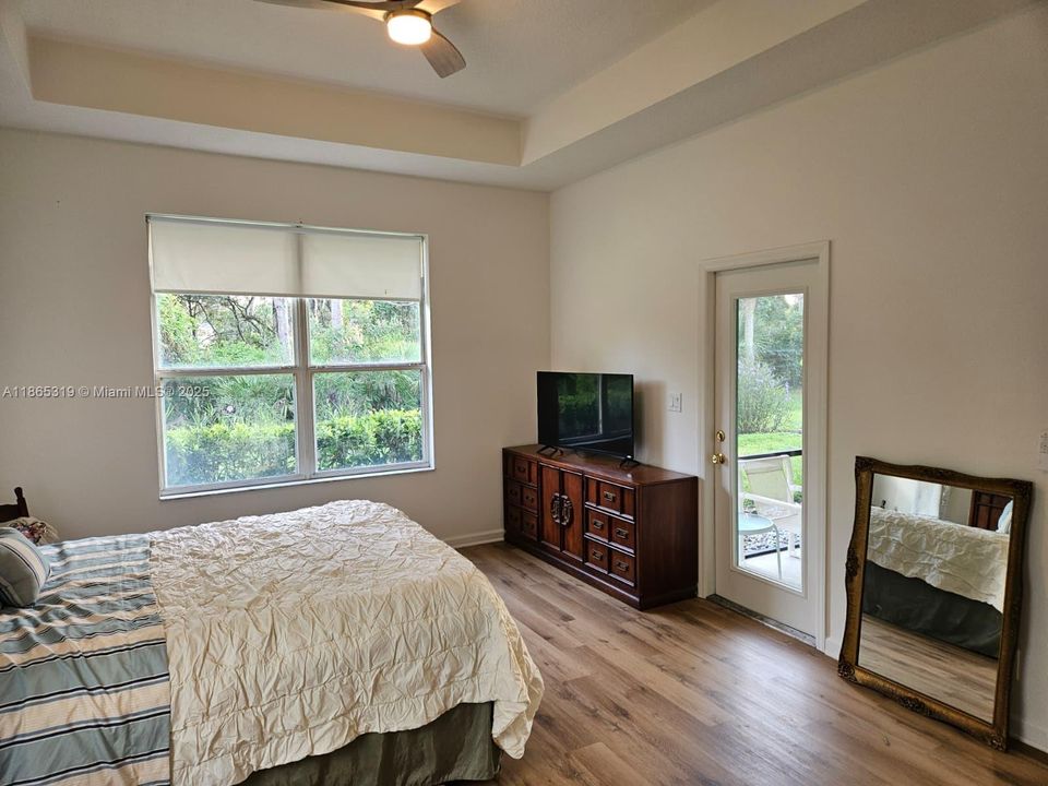 Opens to screened patio overlooking greenbelt