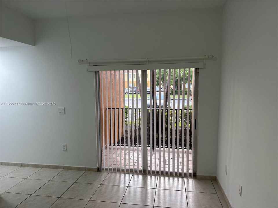 Primary Bedroom with Balcony