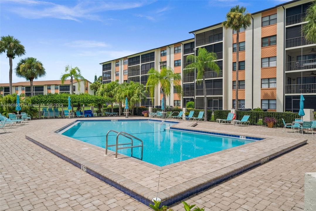 The pool is just steps from the condo