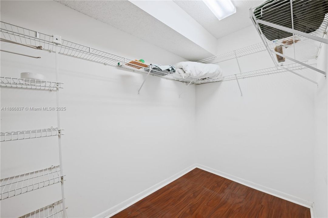 Primary Bedroom walk in closet