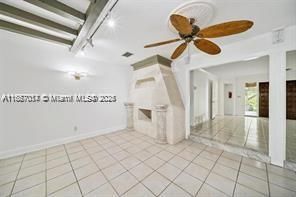 Family Room w/ Mock Fireplace