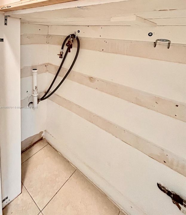 Laundry hook-up for washer and dryer and storage