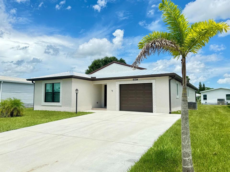 Extended driveway - Metal Roof
