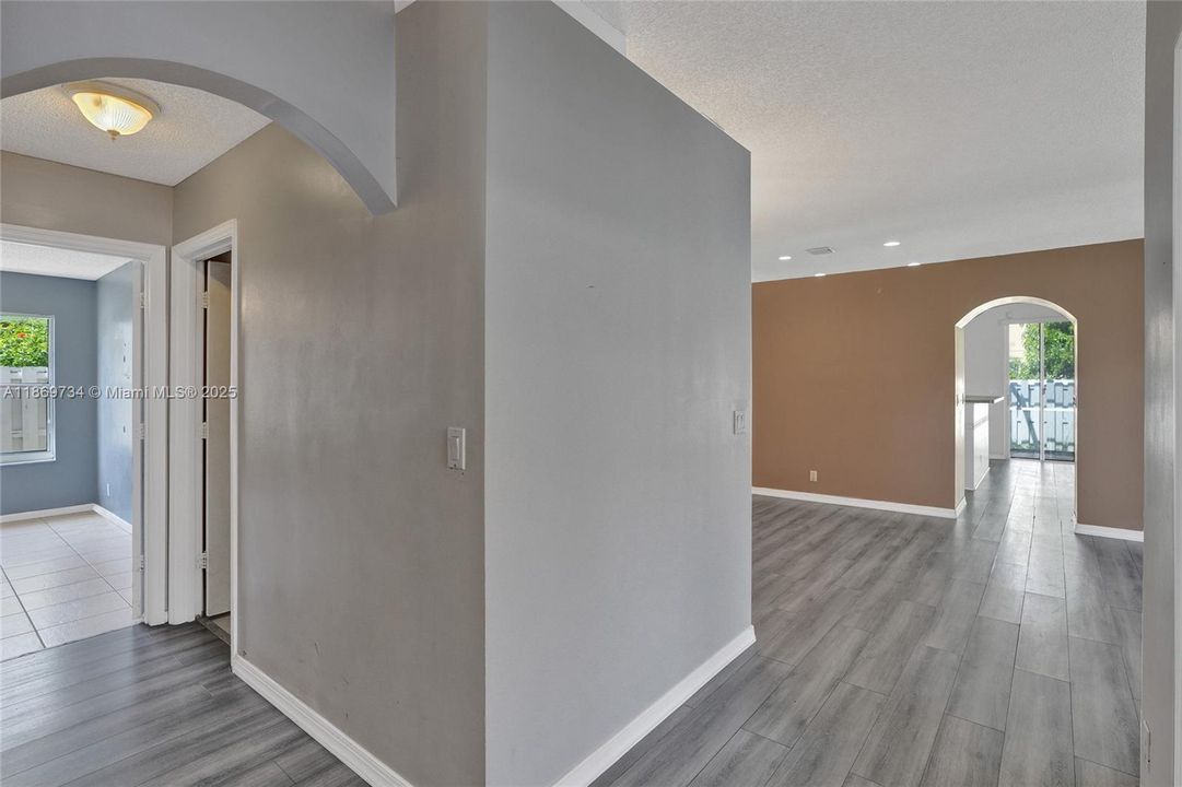 Hall area leads to bedroom #3 and full bath#2