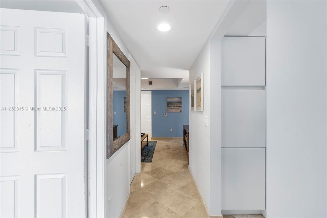 HALLWAY THAT CONNECTS BEDROOMS.