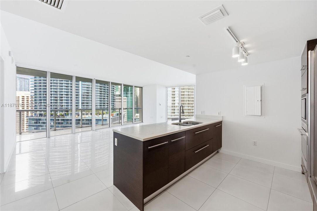 Open concept kitchen with eat-in countertop