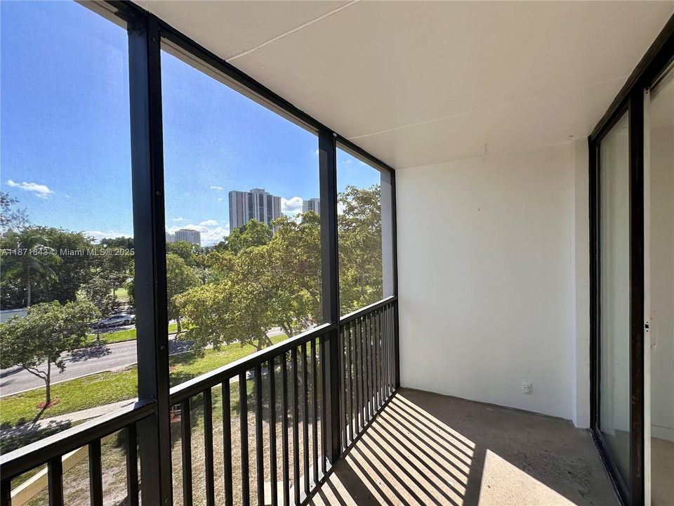 Spacious Balcony overlooking lush green and the Golf Course nearby.3301 N Country Club Drive, Unit #410, Aventura, FL 33180. Bravura Condo. For Sale! Make an offer NOW!