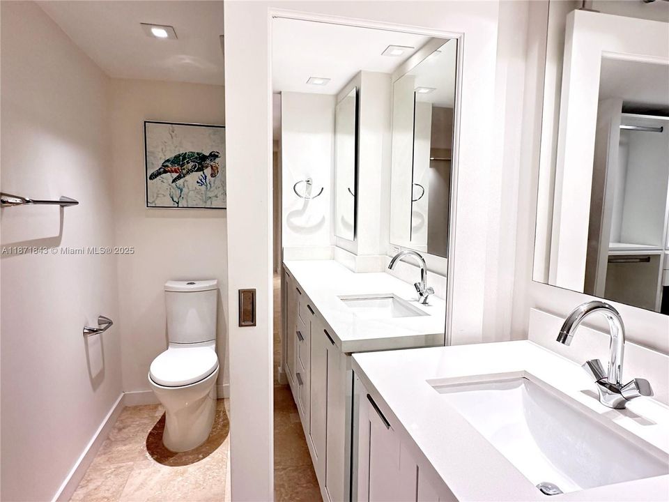 Stylish and fully renovated bathroom with shower/tub combination.3301 N Country Club Drive, Unit #410, Aventura, FL 33180. Bravura Condo. For Sale! Make an offer NOW!