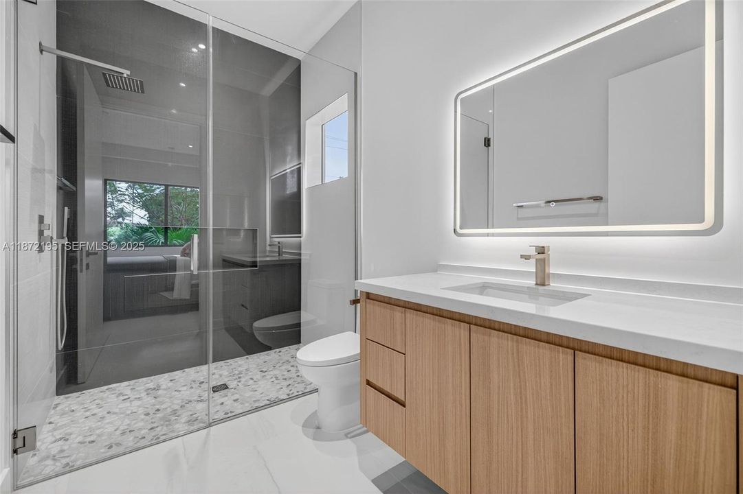 3rd Suite w/walk in closet & bath