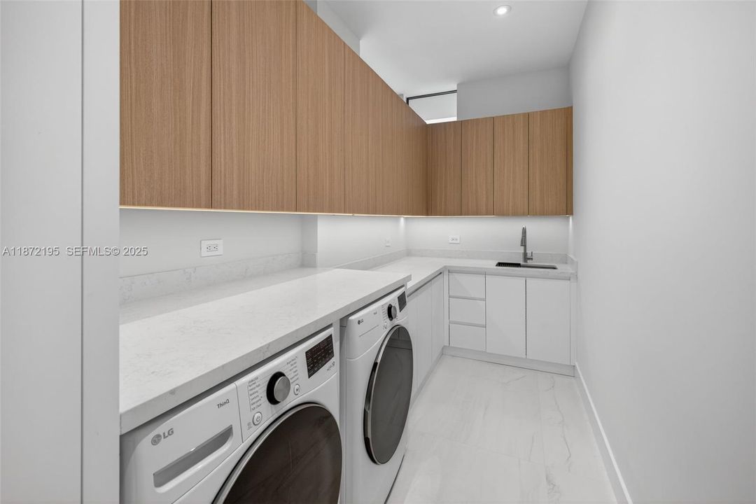 Laundry Room with Story Windows