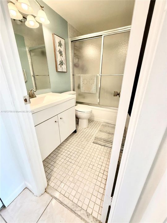 Master bathroom with shower tub