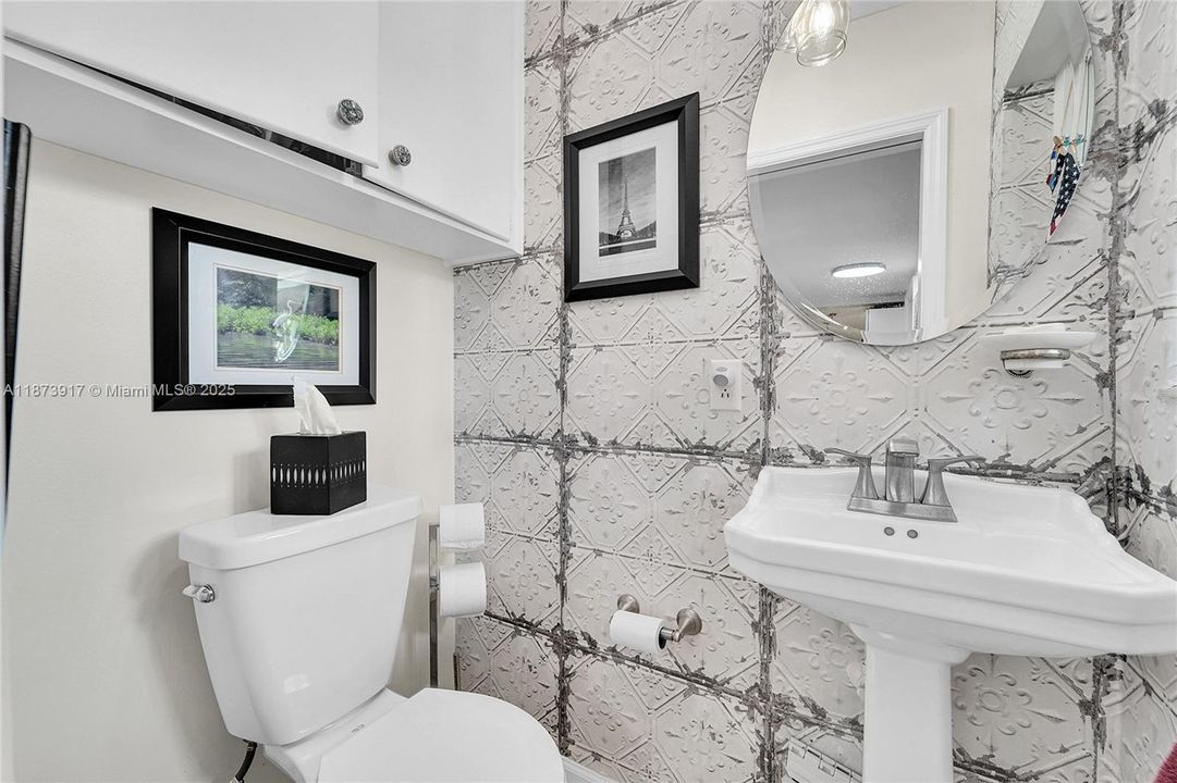 1/2 bathroom off of butlers pantry