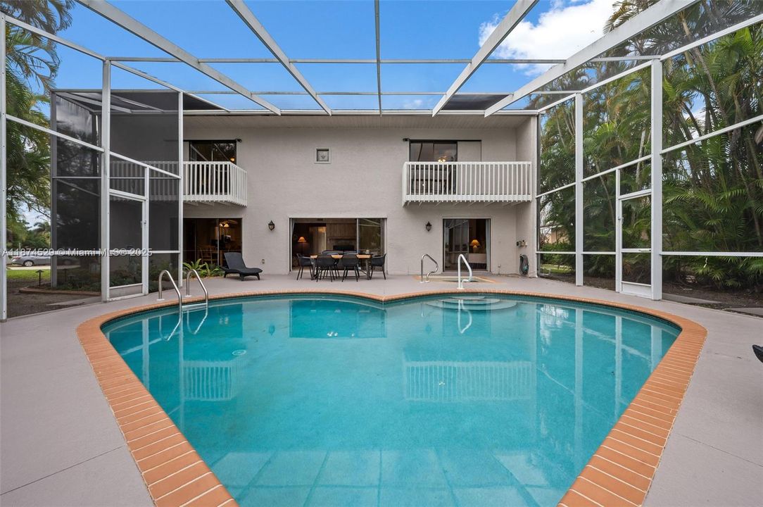 Come and enjoy this large, heart-shaped pool!