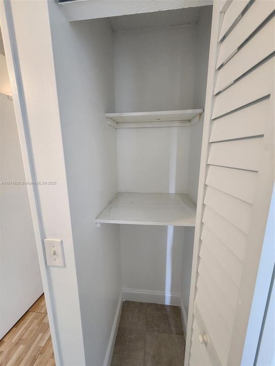 1 of 2 linen closet
