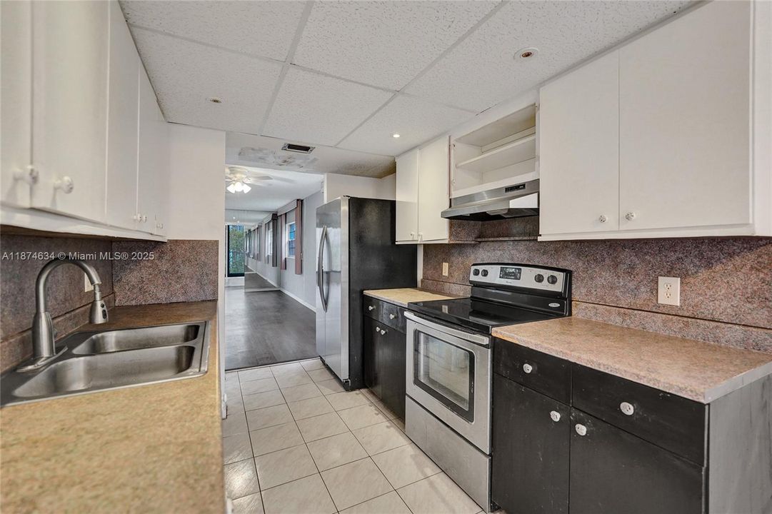 THE KITCHEN IS LARGE & OPEN