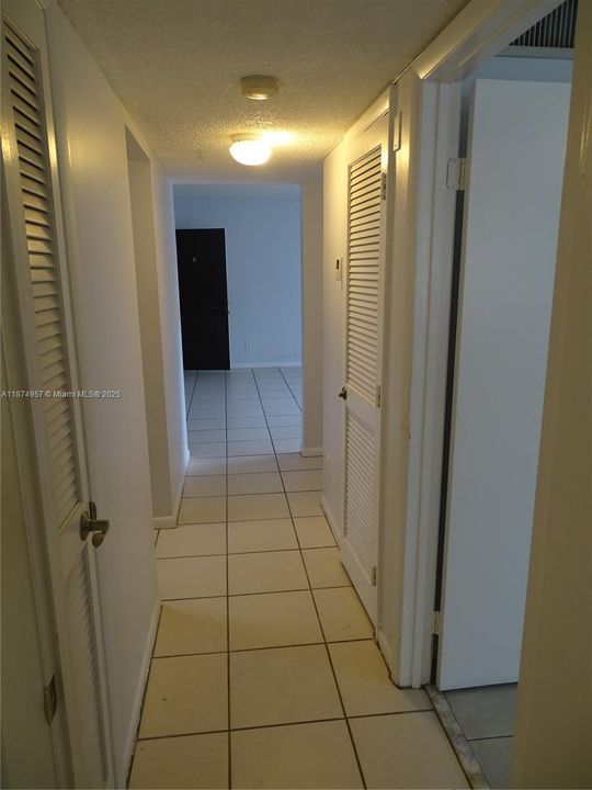 “Hallway connects the kitchen, bedroom, and bathroom.”