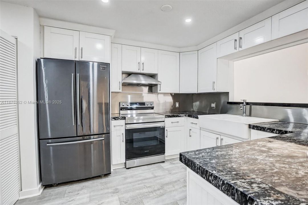 Roomy kitchen, plenty of cabinetry