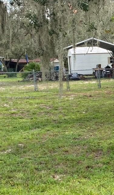 yard with neighboring fence separation