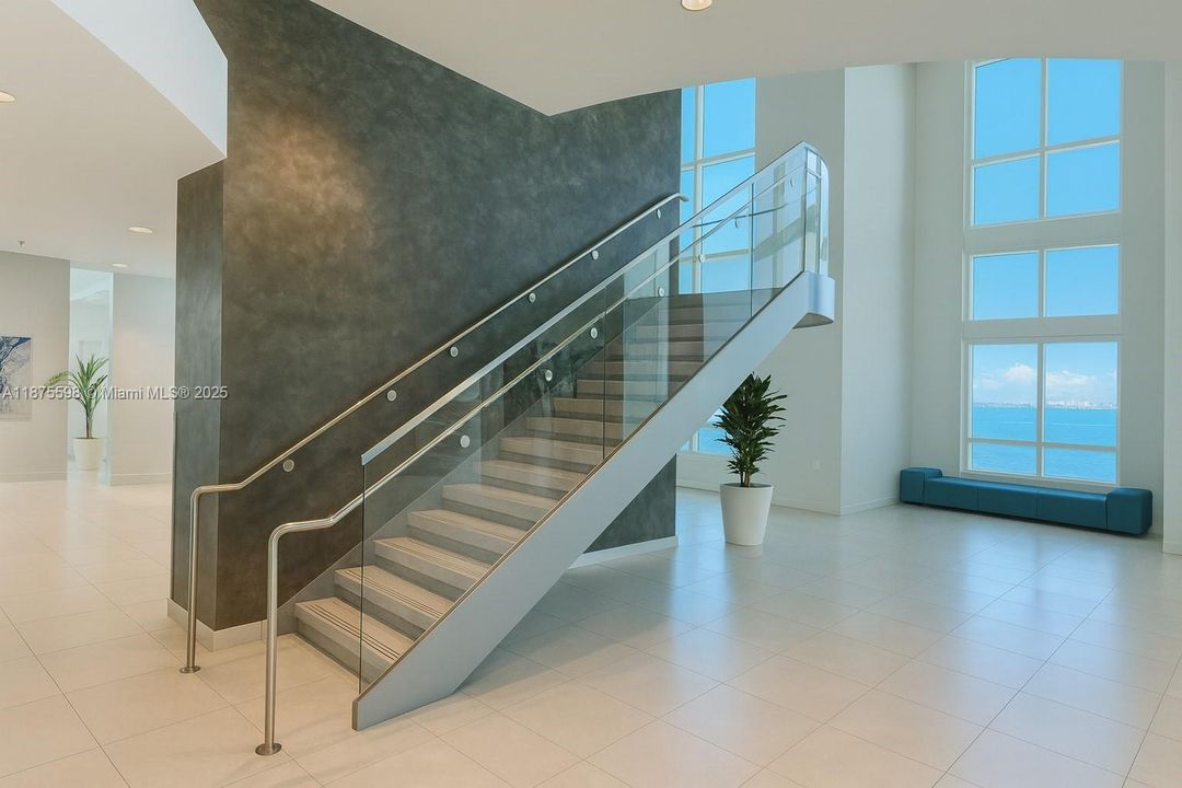 beautiful bay front common areas.  -  ai used to render this image