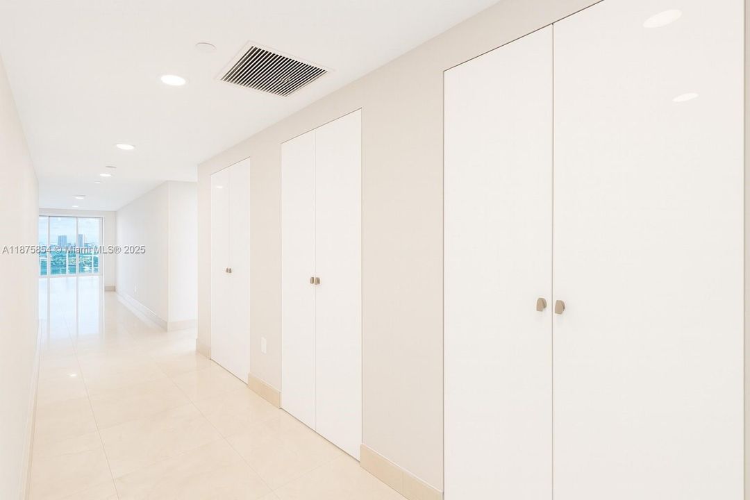 Hallway with storage.Photos may be digitally staged or AI-edited for visualization purposes.