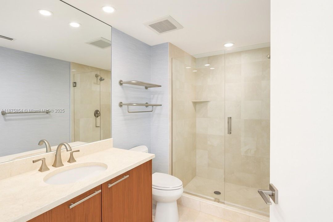 Second Bedroom bath.Photos may be digitally staged or AI-edited for visualization purposes.