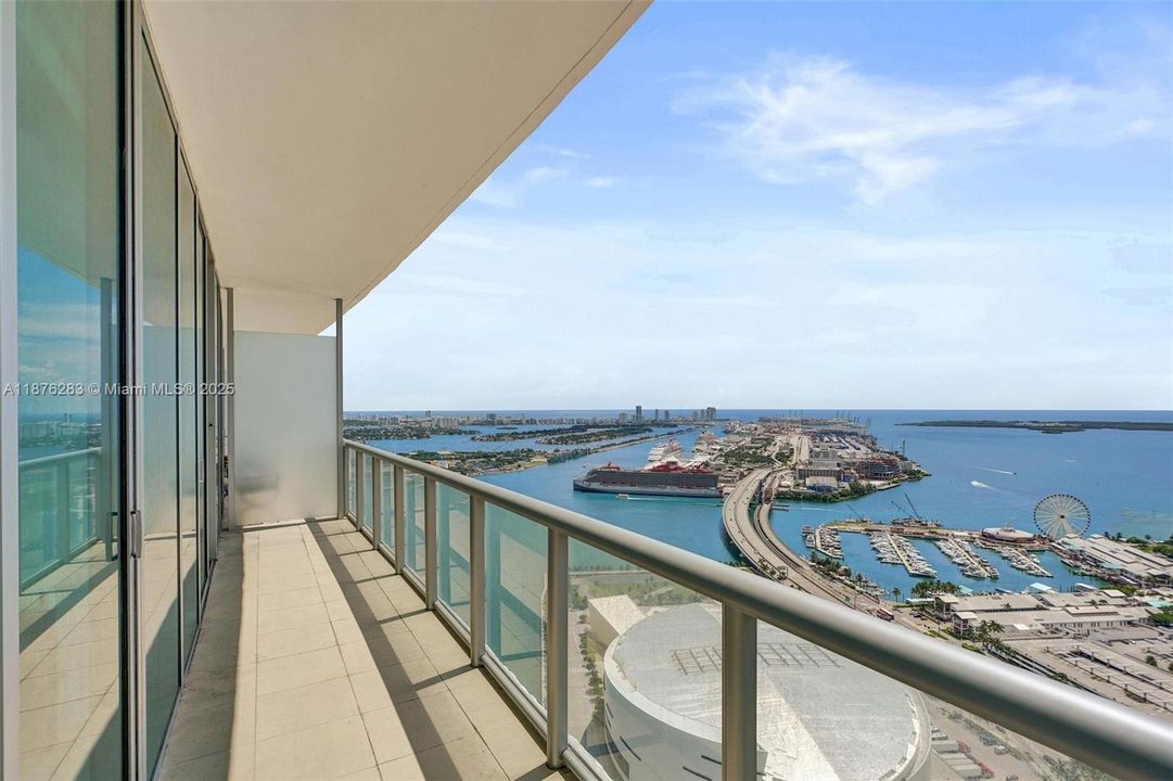 Unmatched vistas of the Port of Miami, cruise ships, and the open bay — a signature Miami skyline view that never gets old.