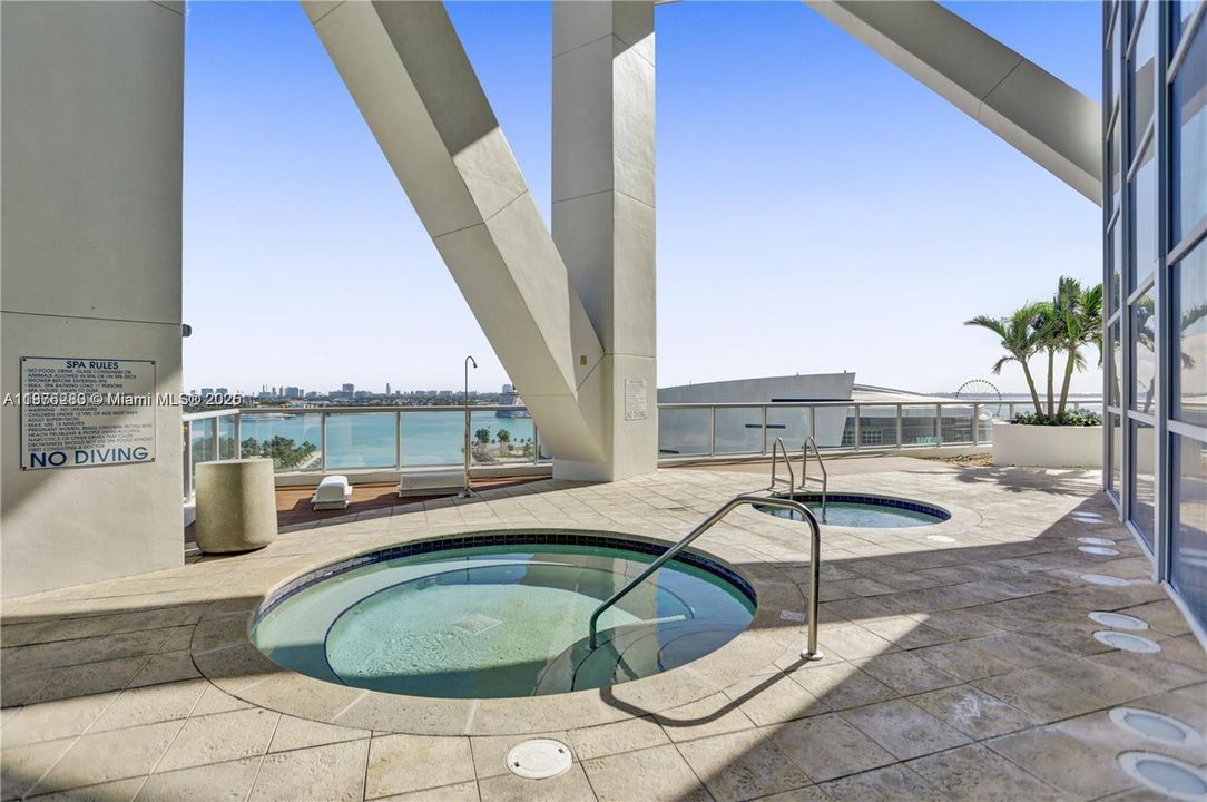 Relax and unwind in the elevated spa overlooking Biscayne Bay and the Port of Miami skyline.