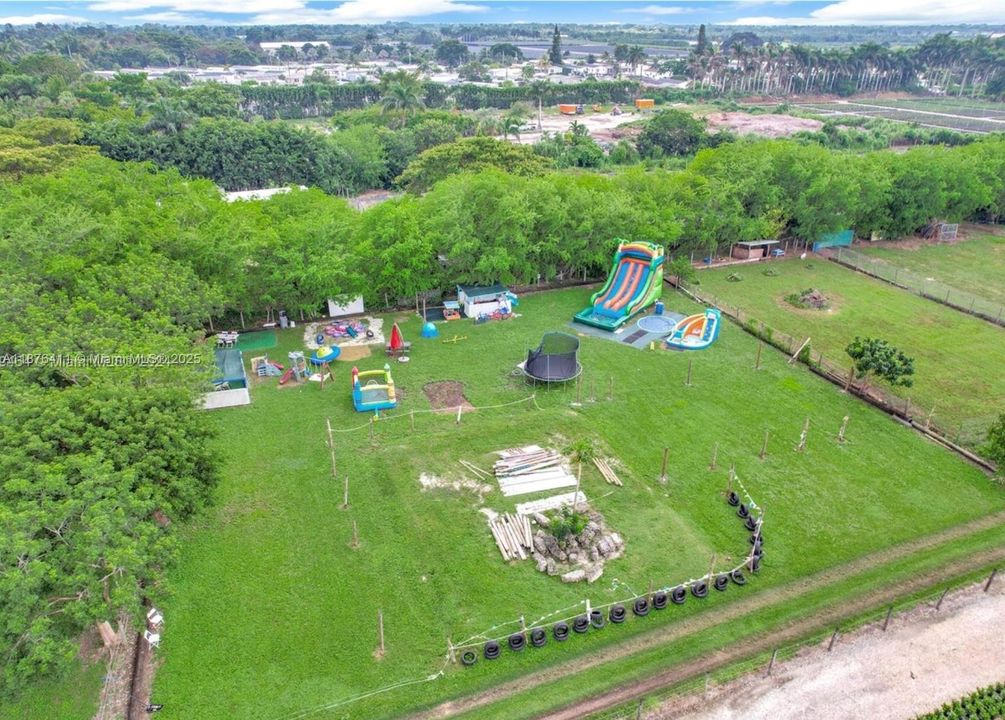 Drone footage of play area. Potentilal water park.