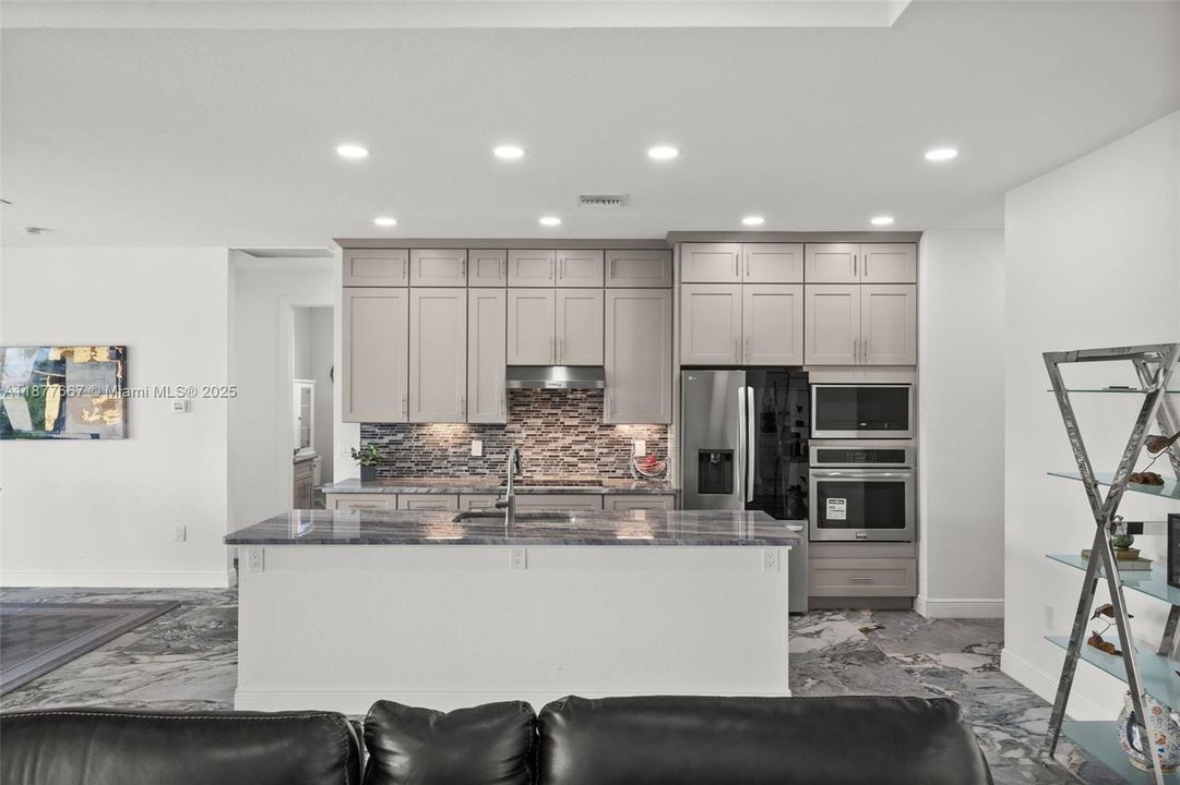 Sleek custom tile backsplash