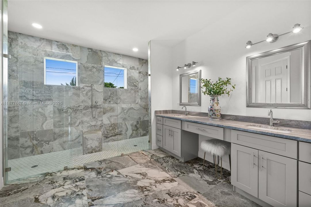 Huge glass and tile wet room in the Master