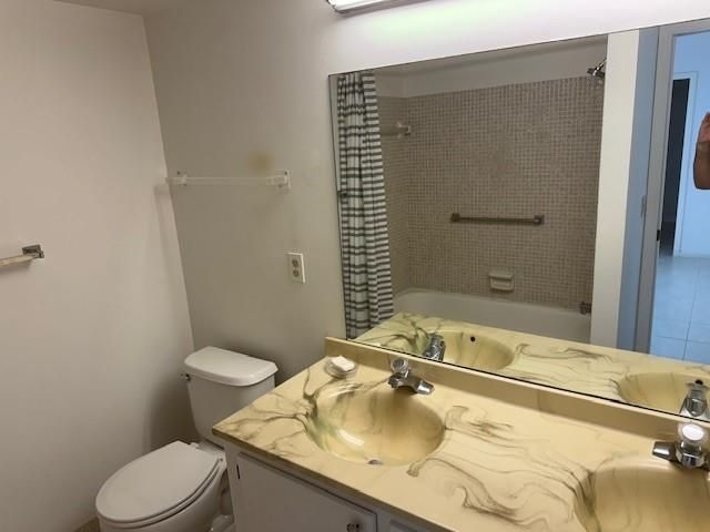 Full bathroom in Primary Bedroom.
