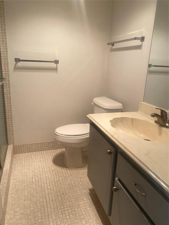 Full bathroom in hallway.