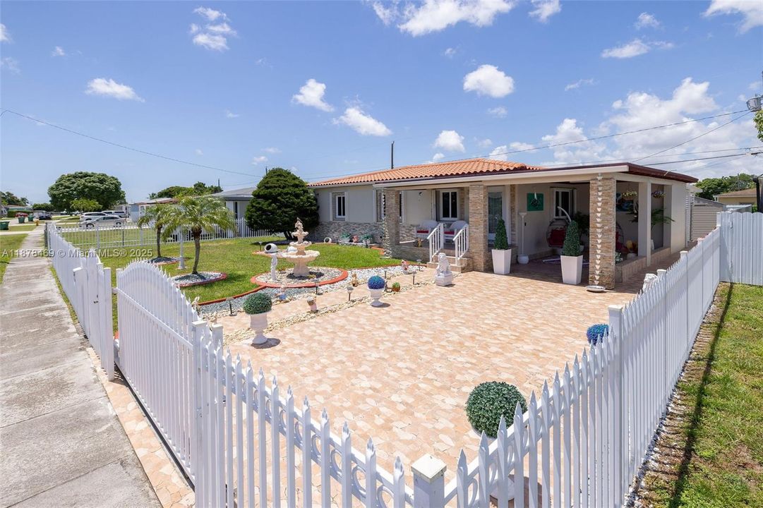 Electric gate.  Gates on both sides of the house to enter the backyard.