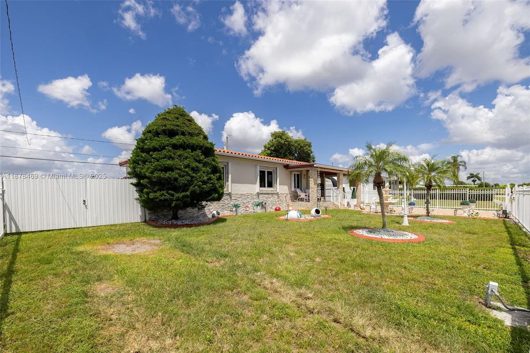 Side gate wide enough for recreational vehicle/boats.