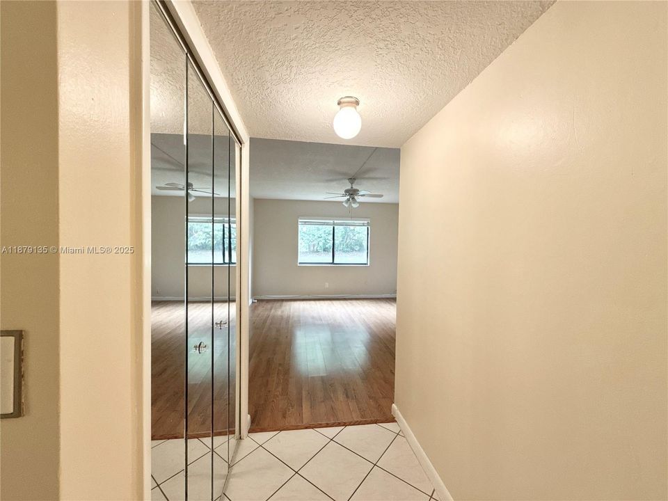 entry to primary bedroom. Small closet on the left