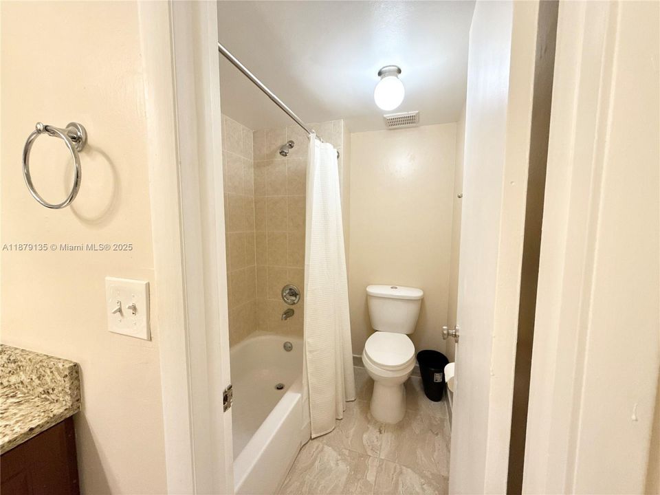 separate section for toilet and shower in primary bathroom