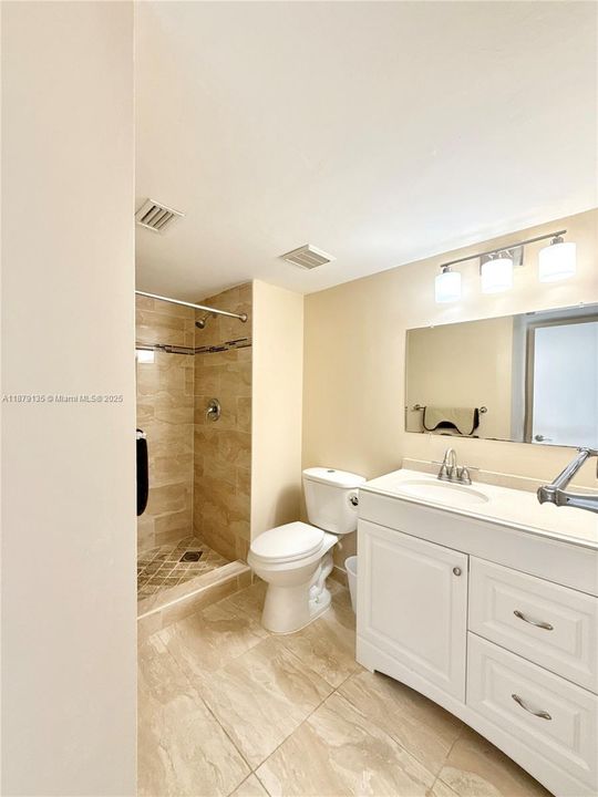 secondary bathroom with walk-in shower
