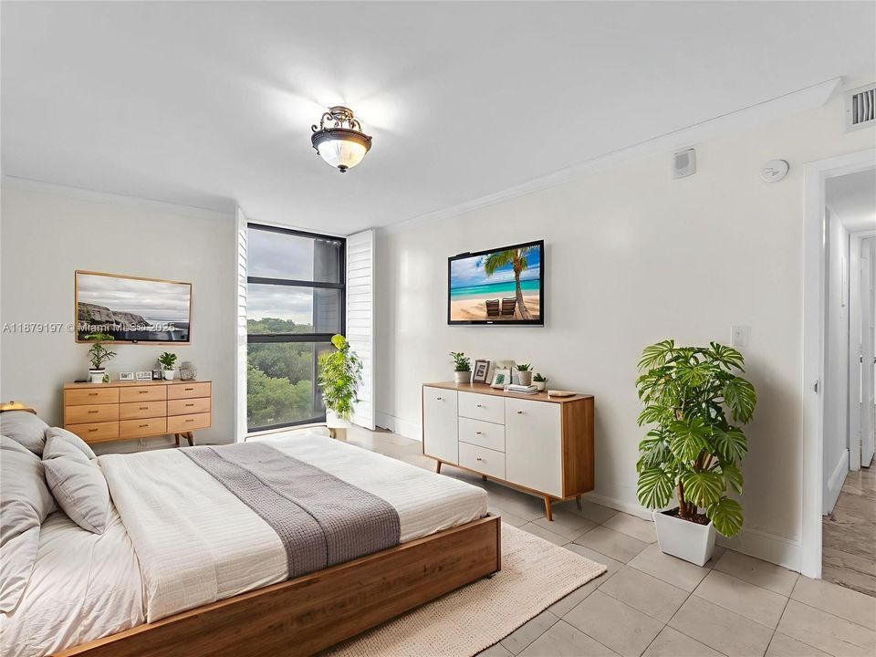 Master Bedroom with in-suite bathroom. Virtual Staged Furniture