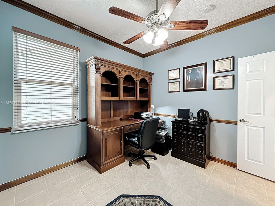 Bedroom that owner uses for a home office area