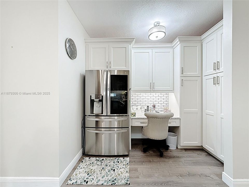 Bonus area to have desk with phone in kitchen close to the pantry