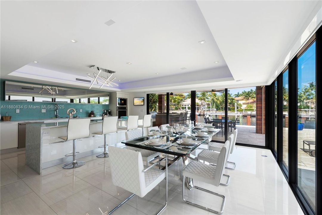 Bright dining with wall to wall glass