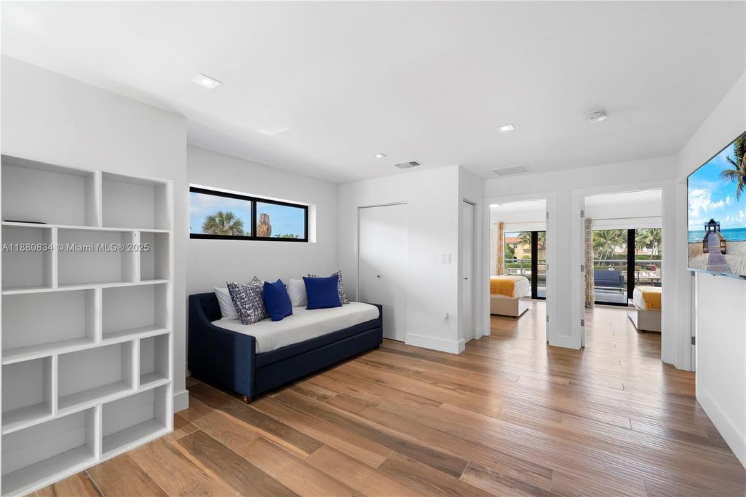 Bright sitting room with built ins