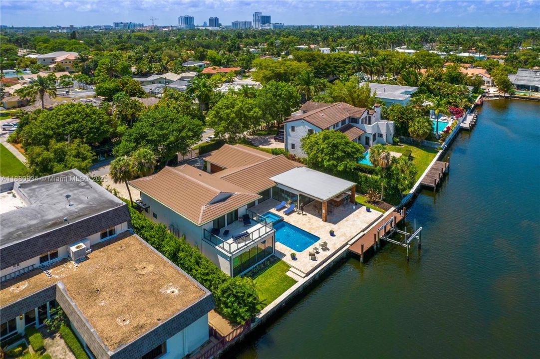 Aerial shot showcasing the homes lining the curving waterway.