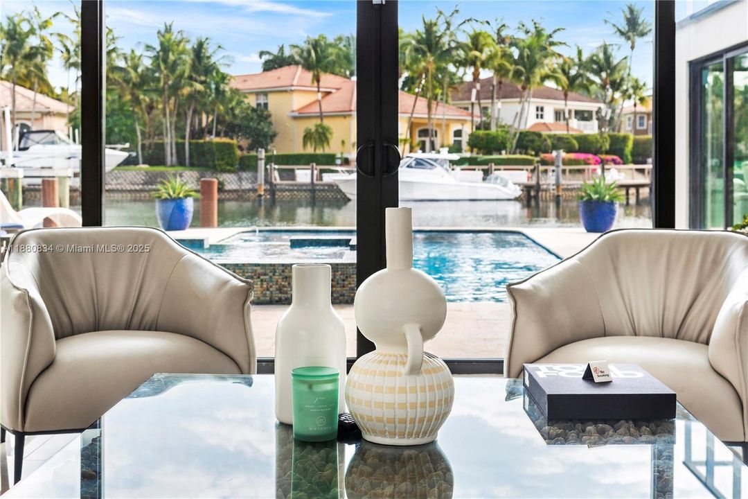 Relaxing pool area with lounge seating and tropical ambiance.