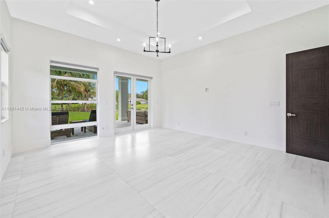 Primary Bedroom opens to the outdoor living area