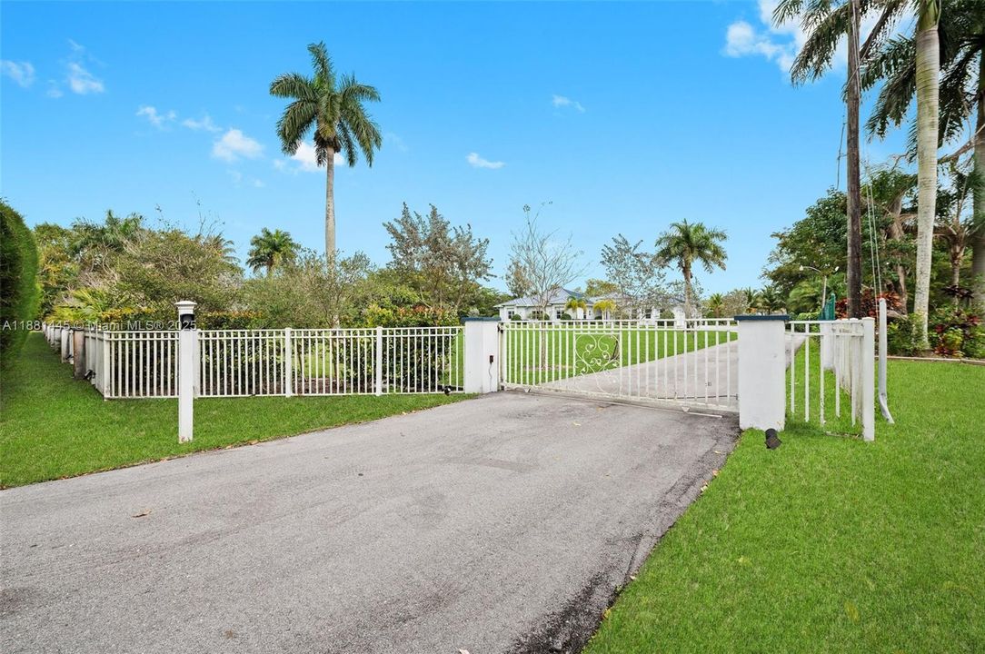 Private Gated Entry -Motorized main gate with solar-powered backup battery