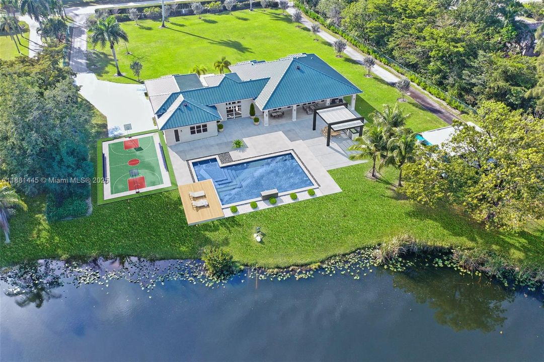 Rendering of Resort Pool, Summer Kitchen and Sport Court Overlooking Lake